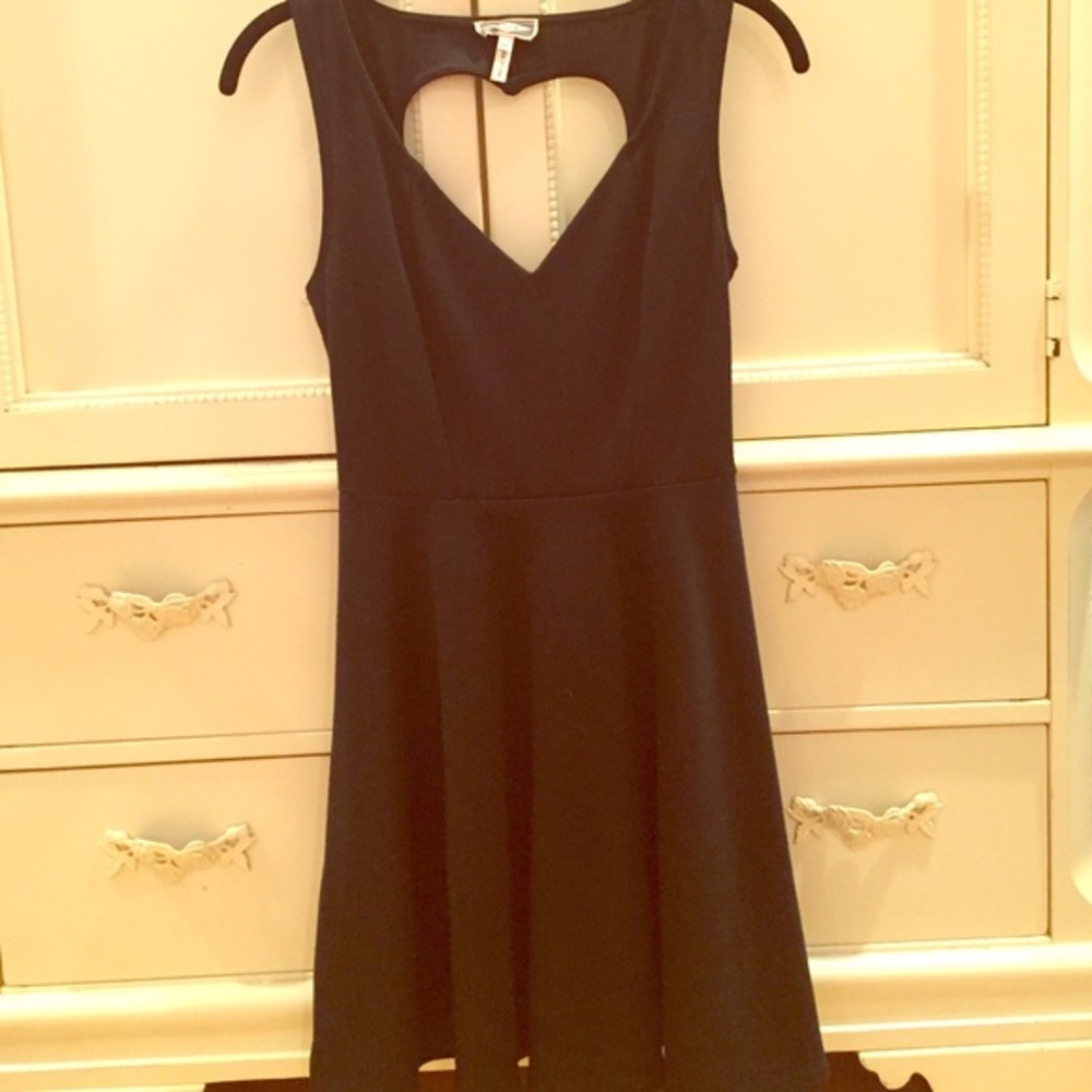 Classic black dress with heart cutout on back